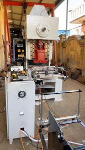 Induction Wad Punching Machine