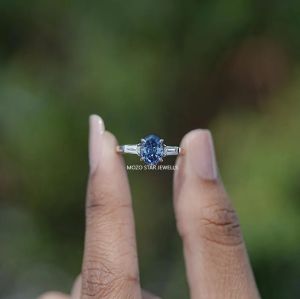 Solid Gold (10KT Step Cut Oval Moissanite Ring