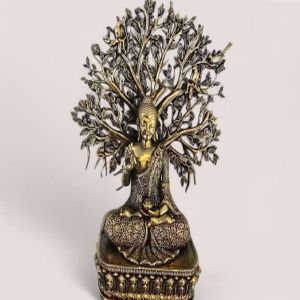 Brass Buddha Statue Sitting Under The Kalpavriksha Tree