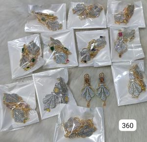 Polished Platinum Earrings Party Wear