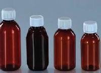 plastic cough syrup bottles