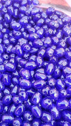 Blue colured glass bead