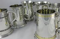 silver  mugs