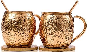 COPPER MUG WITH BRASS HANDLE.