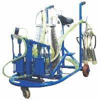 PEDAL OPERATED MILKING MACHINE