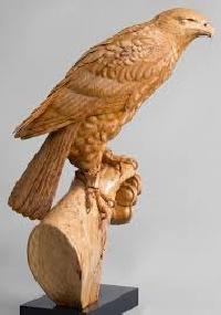 wooden birds statues