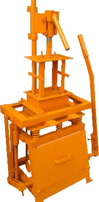 Concrete brick making machine