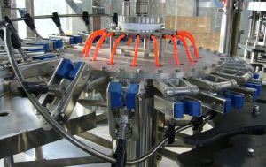 AUTOMATIC  GLASS BOTTLE FILLING MACHINE