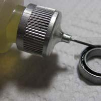 adhesive chain oil spray