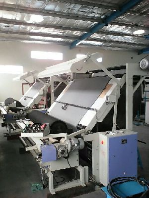 Fabric Inspection cum Checking Machine