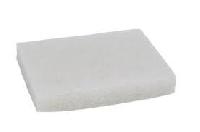 white scrubbing pad