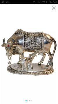 white metal cow & calf statue
