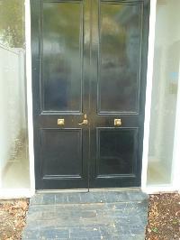 DOUBLE FRONT ENTRANCE TIMBER PANELED DOORS