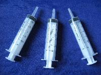 Irrigating Syringe