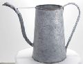 antique metal watering can