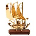 brass ship wooden base