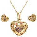 Red gold engraved heart shaped pendant