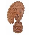 handmade wooden figurine peacock
