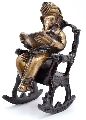 Brass Ganesha On Rocking Chair Statue