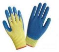 Yellow latex coated cotton glove