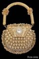 Golden flat rounded metal bag with bells