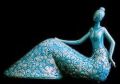 Blue Ceramic Sitting Lady Artifact