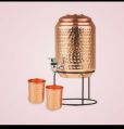 Copper water dispenser with glasses
