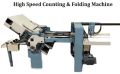 PAPER COUNTING AND FOLDING MACHINE