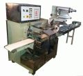 horizontal flow wrap machine