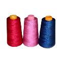 Dyed colured polyester sewing thread