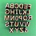 Brown wooden alphabet stamp set