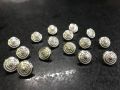 Silver metal down hole buttons