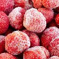 Red frozen whole strawberries