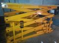 Yellow ESSEM freight hydraulic elevator