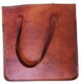 Polished Plain Ladies Brown Leather Handbag