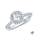A Beautiful Halo Diamond Engagement Ring With Center Diamond