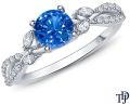 A Vine Inspired Marquise And Round Bud Diamond Engagement Ring With 1.00ct Center Blue Sapphire