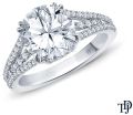 Round semi mount split shank dual claw diamond engagement ring