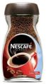 Brown nescafe coffee powder