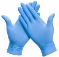 Blue nitrile examination gloves