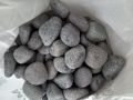 Unpolished black pebbles